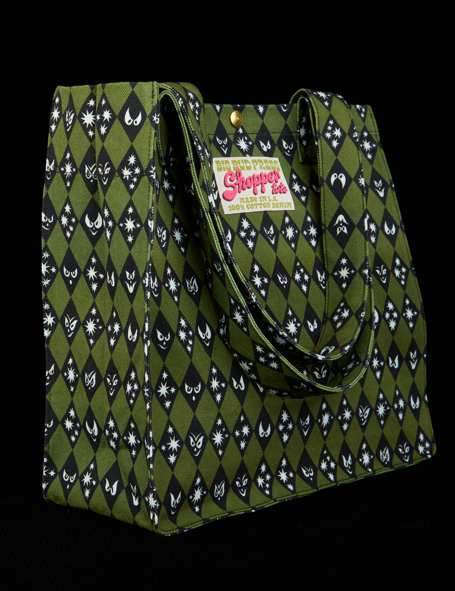 Angled view of Shopper Tote in Glowing Eyes