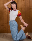 Side view of Calypso Tee in Desert and light wash Indigo Wide Leg Trouser on Alex