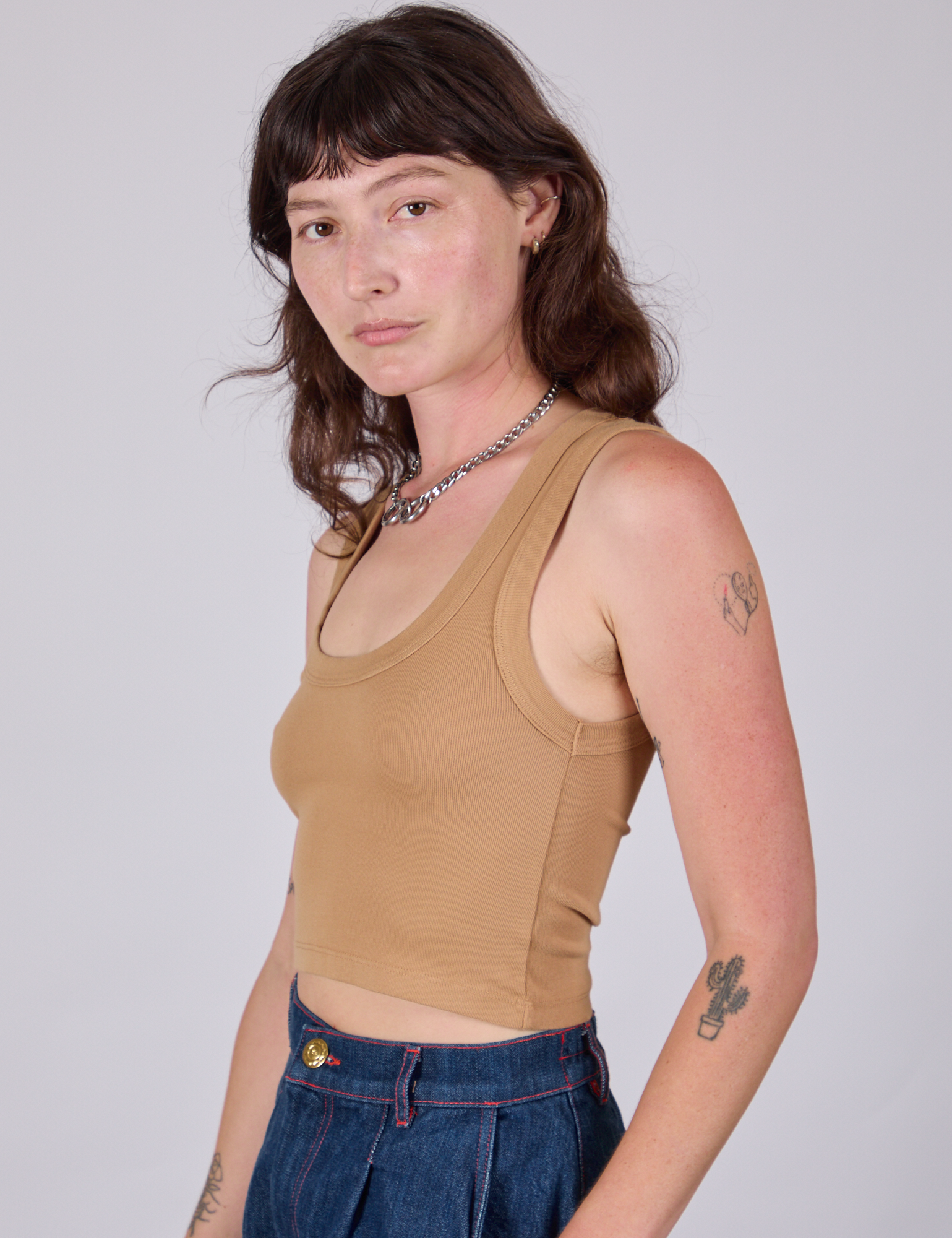 Cropped Tank Top in Tan side view on Alex