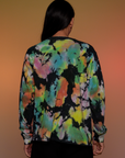 Magic Waters Long Sleeve Burly Tee in Rainbow back view on Anthony