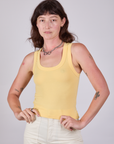 Alex is 5'8" and wearing P Tank Top in Butter Yellow