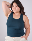Ashley is 5'7" and wearing L Tank Top in Lagoon 