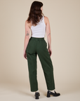 Back view of Heavyweight Trousers in Swamp Green and Cropped Tank in Vintage Tee White on Alex