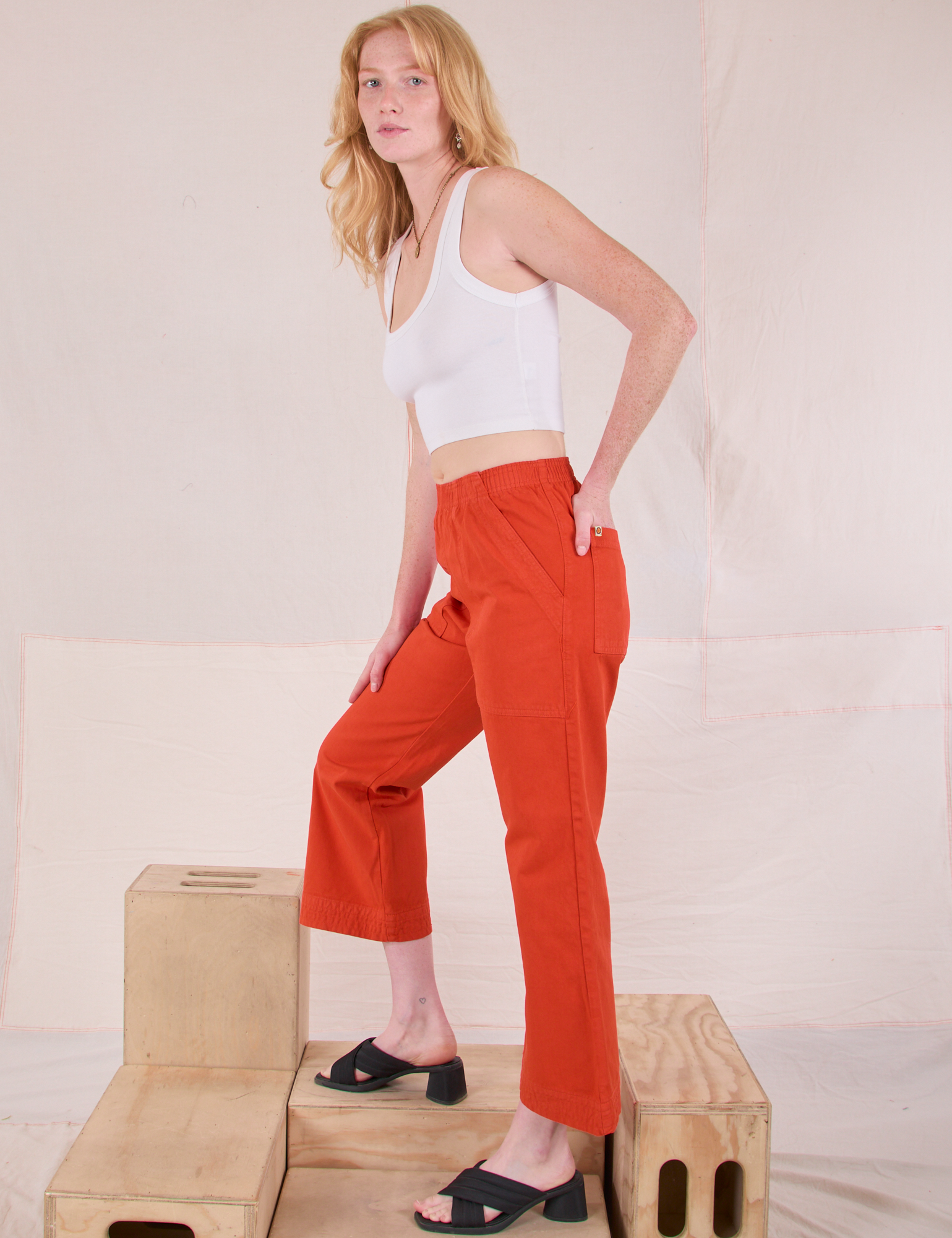 Action Pants in Chili Red side view on Margaret