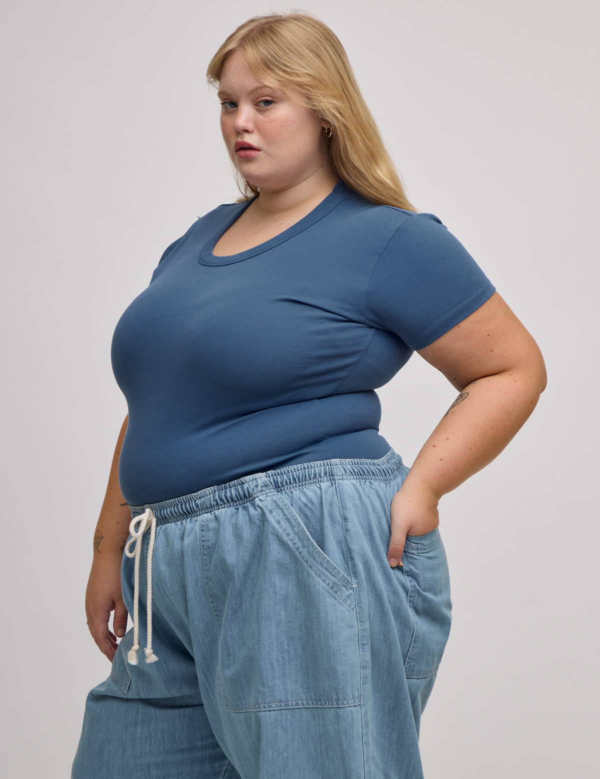 Angled front view of Baby Tee in French Blue on Juliet