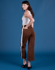 Painted Action Pants in Fudgesicle Brown angled back view on Alex