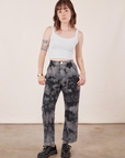 Hana is 5'3" and wearing XXS Petite Black Magic Waters Work Pants paired with vintage off-white Cropped Cami