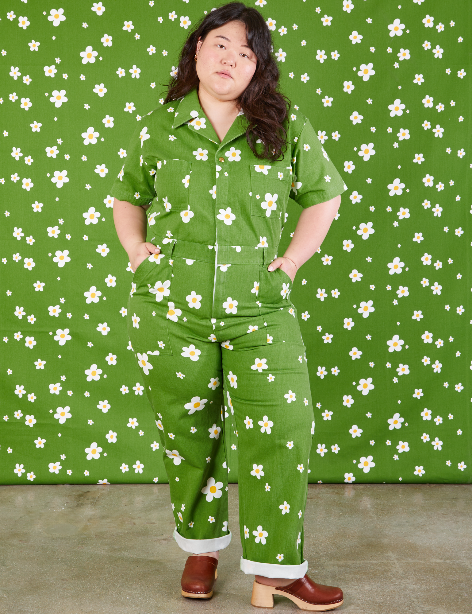 Ashley is 5&#39;7&quot; and wearing 0XL Bob Baker Flower Jumpsuit