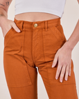 Pencil Pants in Burnt Terracotta front close up on Alex