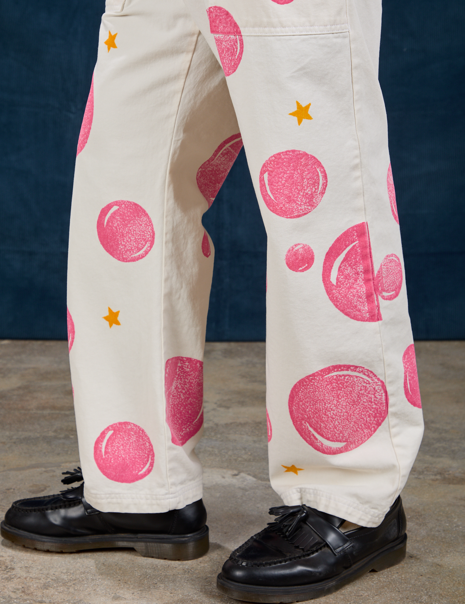 Paintstamped Work Pants in Bubblegum pant leg close up on Isaac