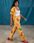 Kandia is wearing Gummy Bear Pantry Button-Up and matching Work Pants
