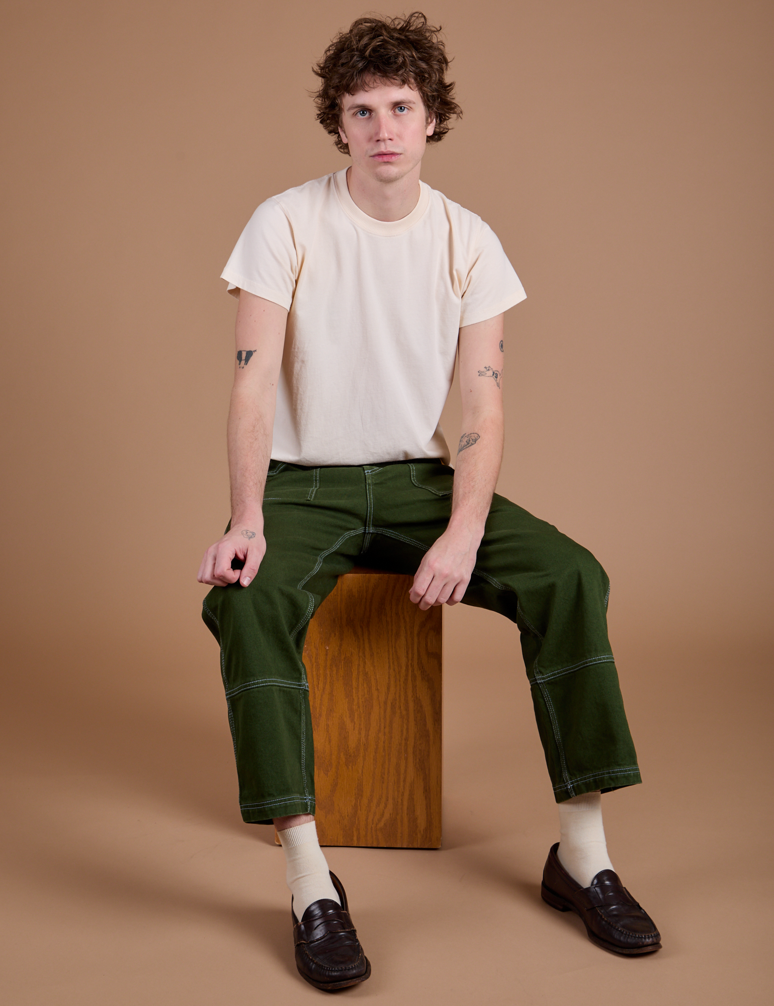 Carpenter Jeans in Evergreen and Organic Vintage Tee in Vintage Tee Off-White on Quinn