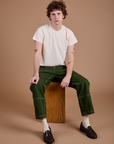 Carpenter Jeans in Evergreen and Organic Vintage Tee in Vintage Tee Off-White on Quinn
