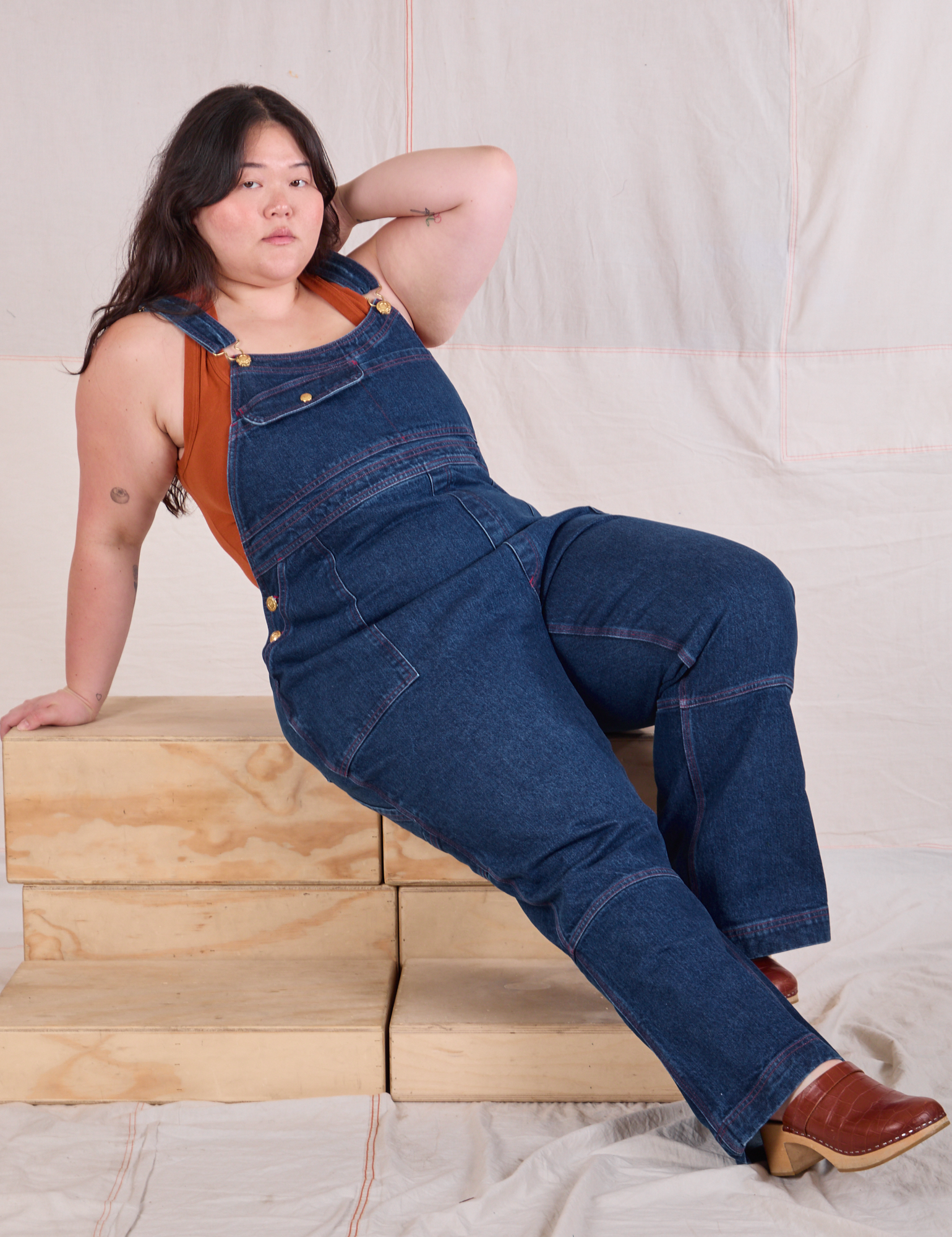 Carpenter Overalls in Dark Wash worn by Ashley