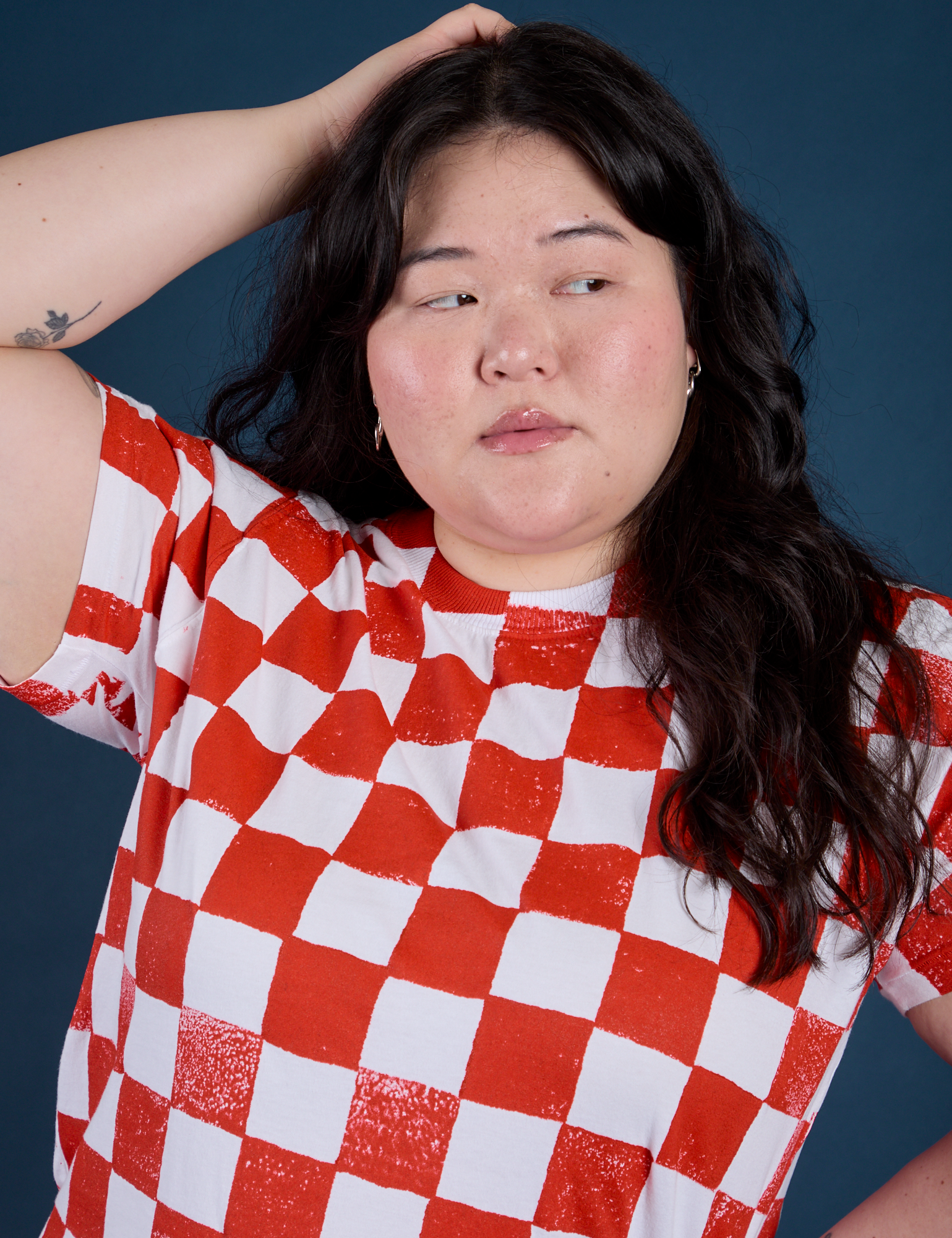 Front close up of Checker Organic Tee in Red on Ashley