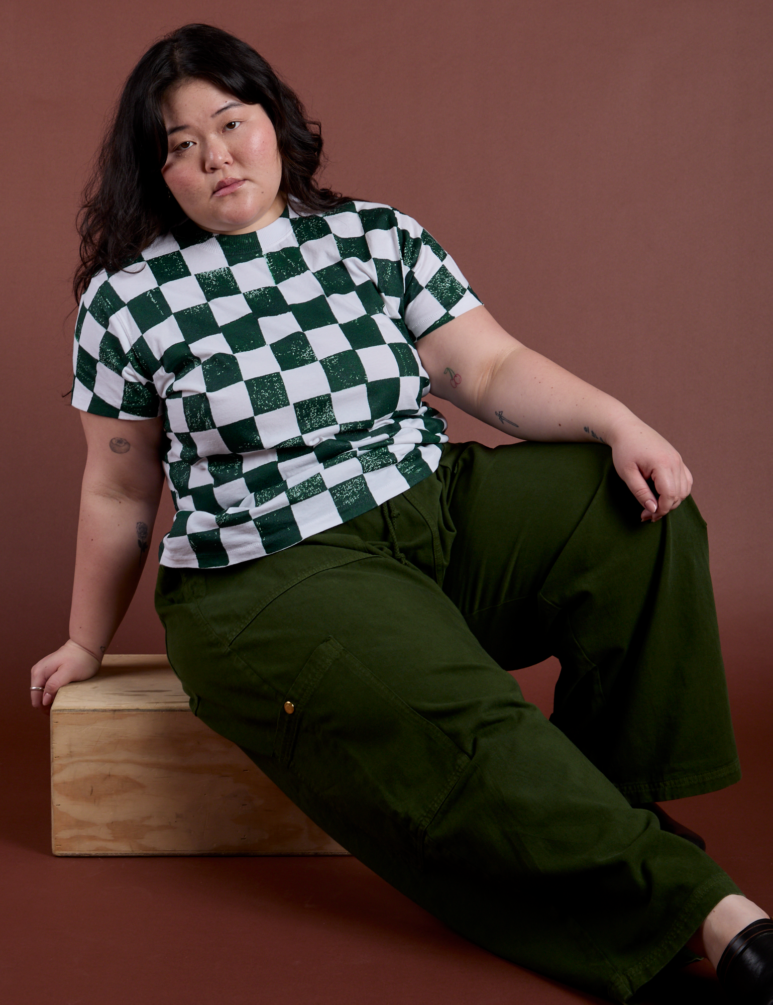 Checker Organic Tee in Swamp Green and evergreen Drop Pocket Cargo Pants on Ashley