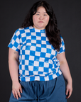 Ashley is 5'7" and wearing L Checker Organic Tee in Blue