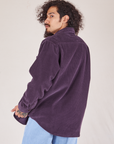 Angled back view of Corduroy Overshirt in Nebula Purple on Jesse