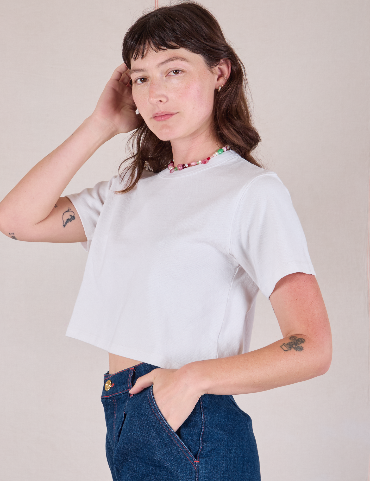 Cropped Burly Tee in Vintage Tee White angled front view on Alex