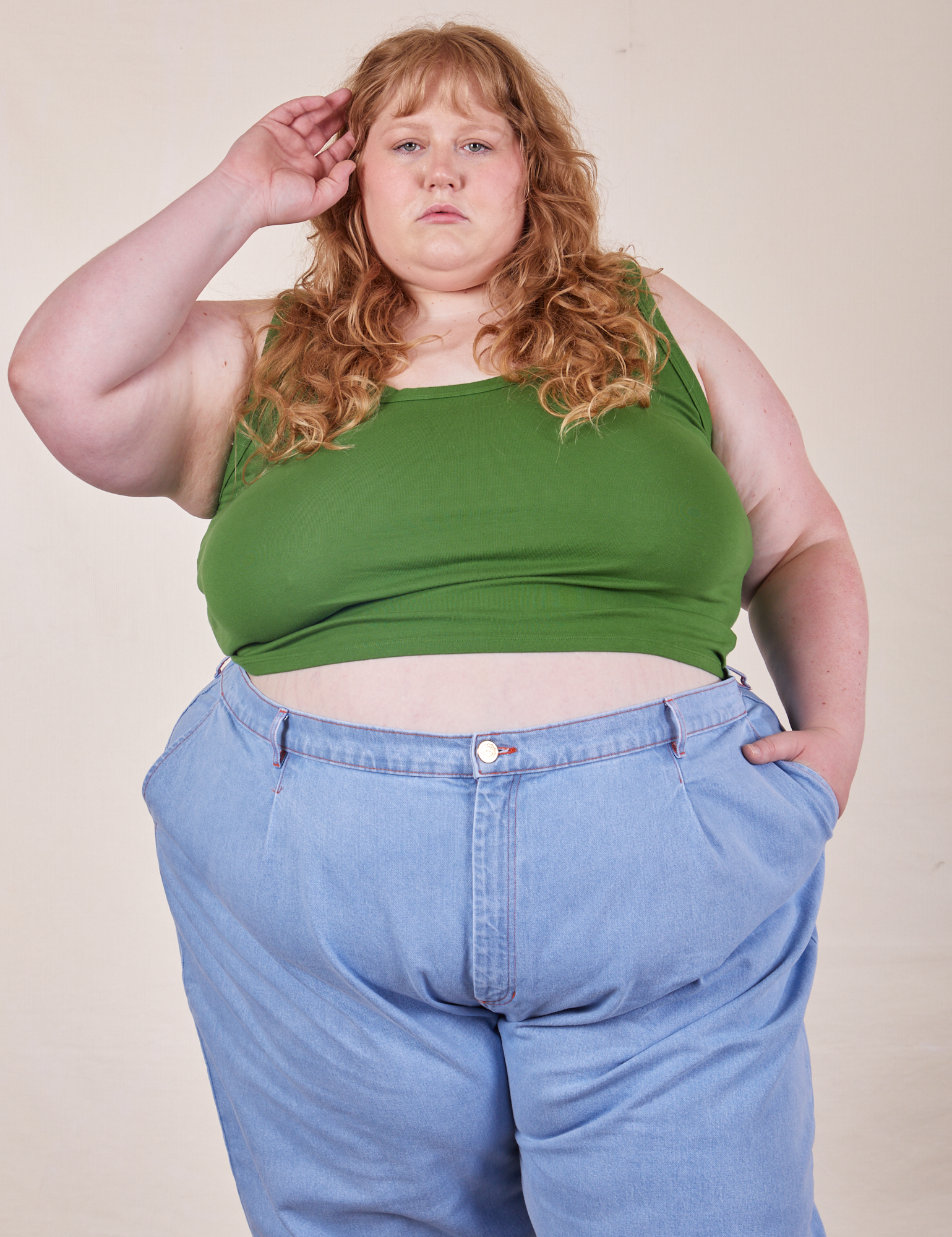 Catie is 5&#39;11&quot; and wearing 4XL Cropped Tank Top in Lawn Green