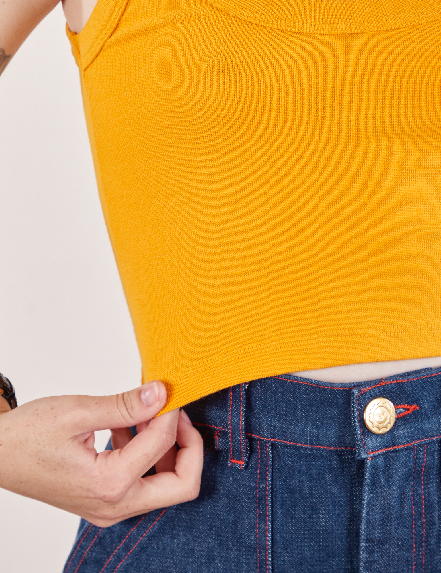 mustard yellow ribbed top