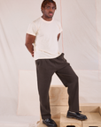 Front angled view on Easy Pants in Espresso Brown and Organic Vintage Tee in vintage tee off-white on Issac