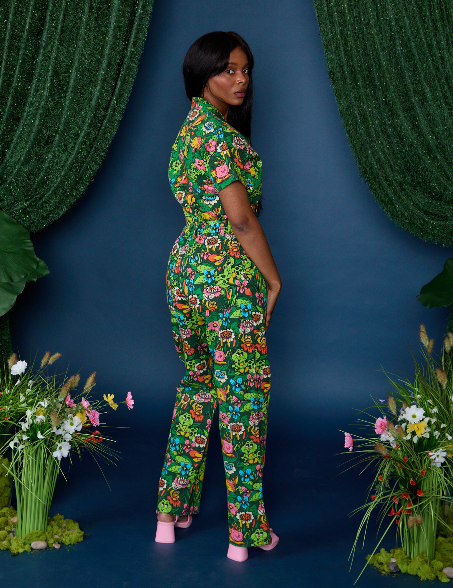 Angled back view of Pond Party Print Jumpsuit on Kandia