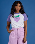 Kandia is 5’3” and wearing P Produce Raglan Tee in Grape