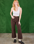 Margaret is 5'11" and wearing XS Gingham Western Pants in Fudge Brown paired with a Cropped Tank in vintage tee off-white