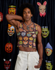 Jerrod is 6'3" and wearing M Cropped Tank Top in Halloween Masks