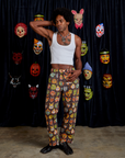 Jerrod is 6'3" and wearing M Work Pants in Halloween Masks paired with a Cropped Tank in Vintage Tee White