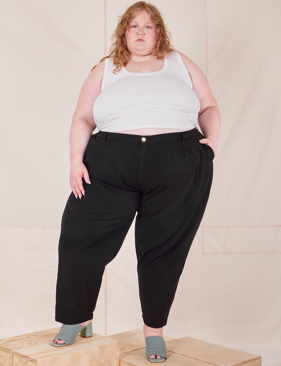 Catie is 5'11" and wearing 4XL Heavyweight Trousers in Basic Black paired with vintage off-white Cropped Tank Top