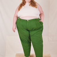 Catie is 5'11" and wearing 4XL Heavyweight Trousers in Lawn Green paired with vintage off-white Sleeveless Turtleneck