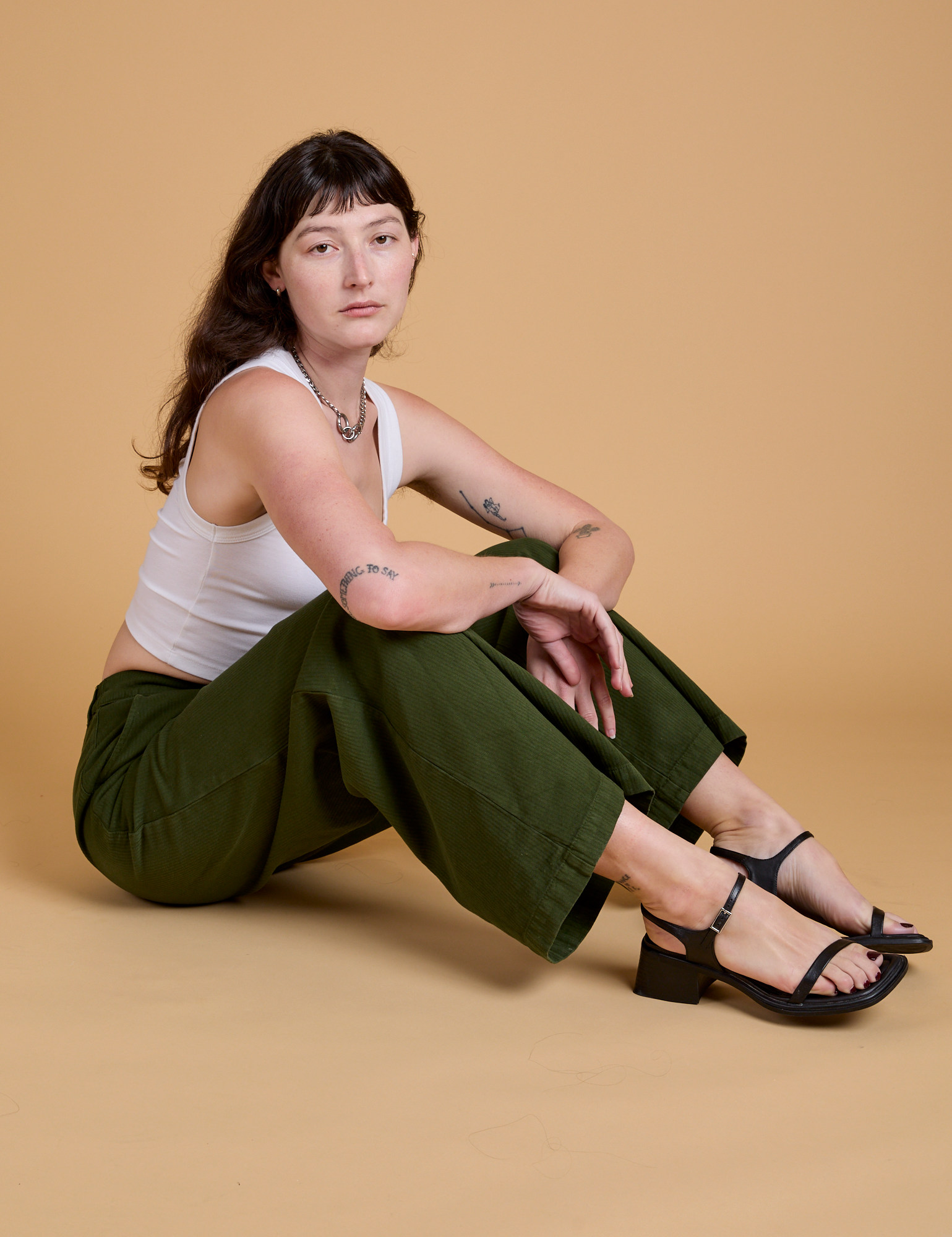 Heritage Wide Leg Trousers in Evergreen worn by Alex