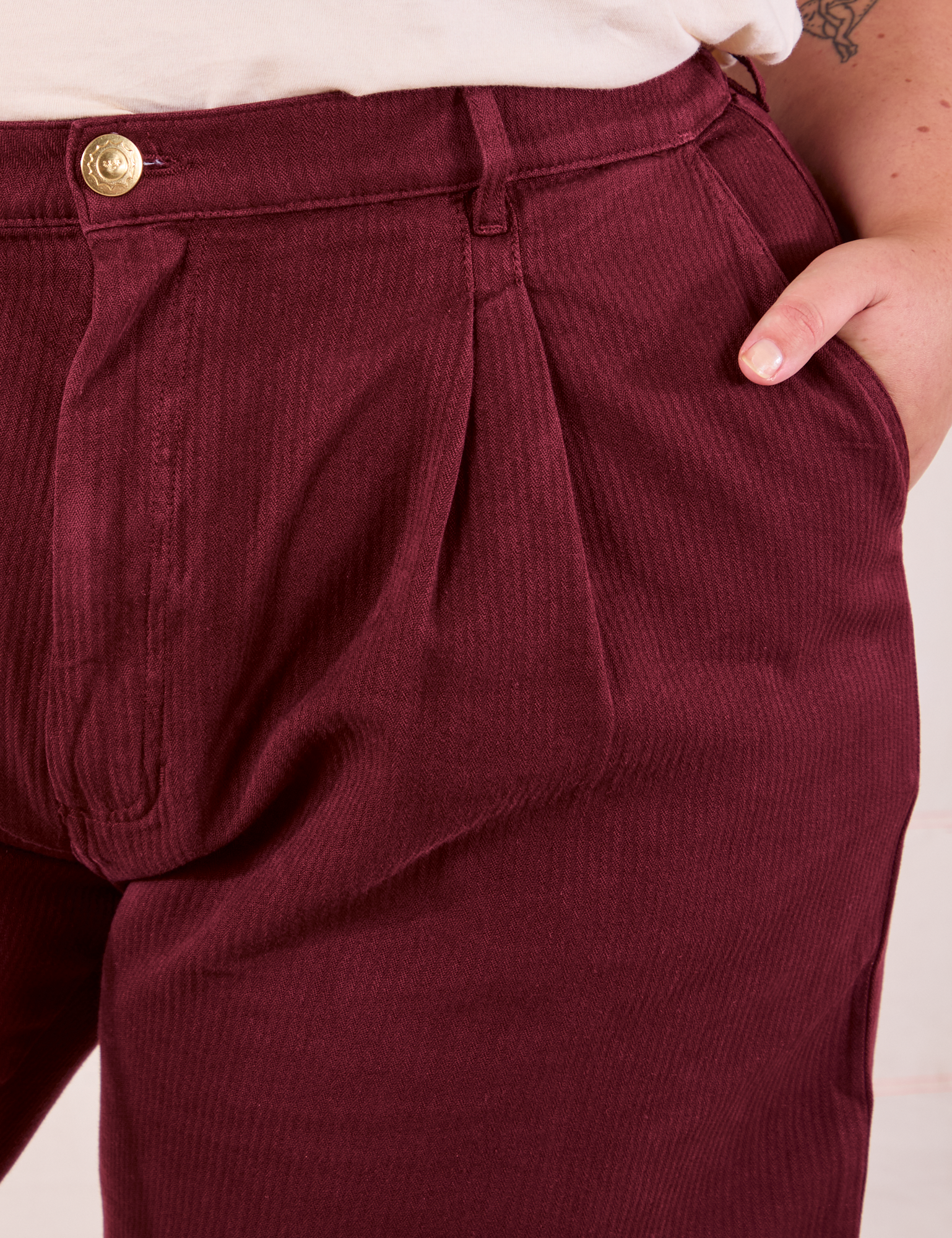 Heritage Trousers in Red Wine front close up on Juliet