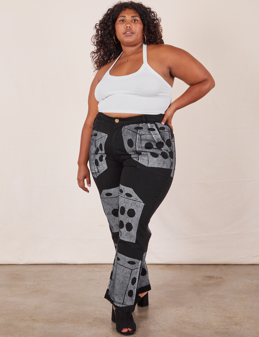 Morgan is 5'5" and wearing 1XL Icon Work Pants in Dice paired with vintage off-white Halter Top
