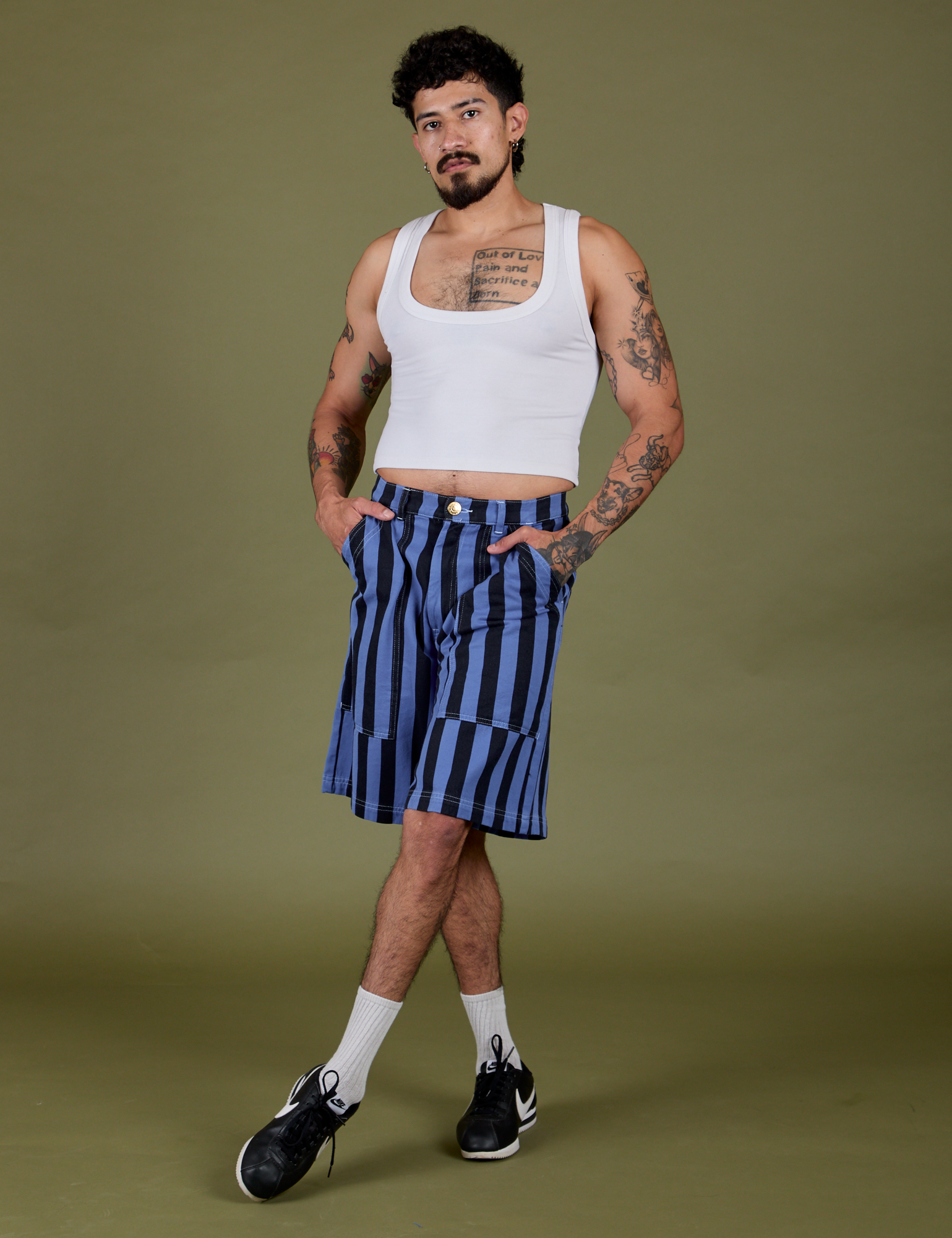 Jesse is 5’8” and wearing S Longline Work Shorts in Cornflower paired with vintage tee white Croppedd Tank