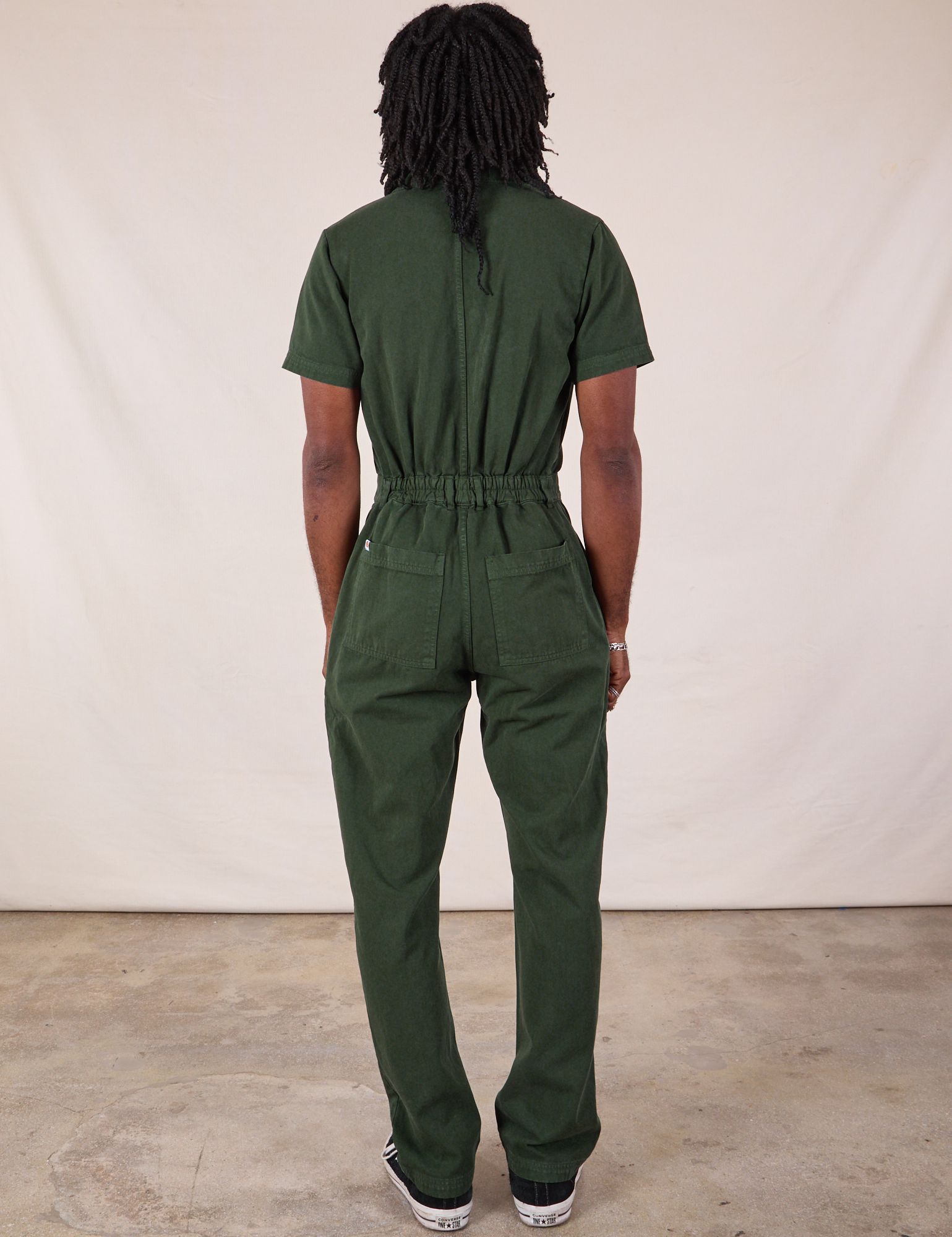 Long Jumpsuit in Swamp Green back view on Jerrod