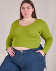 Marielena is 5'8" and wearing XL Long Sleeve V-Neck Tee in Gross Green