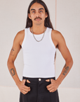 Anthony is wearing Racerback Tank in Vintage Tee Off-White