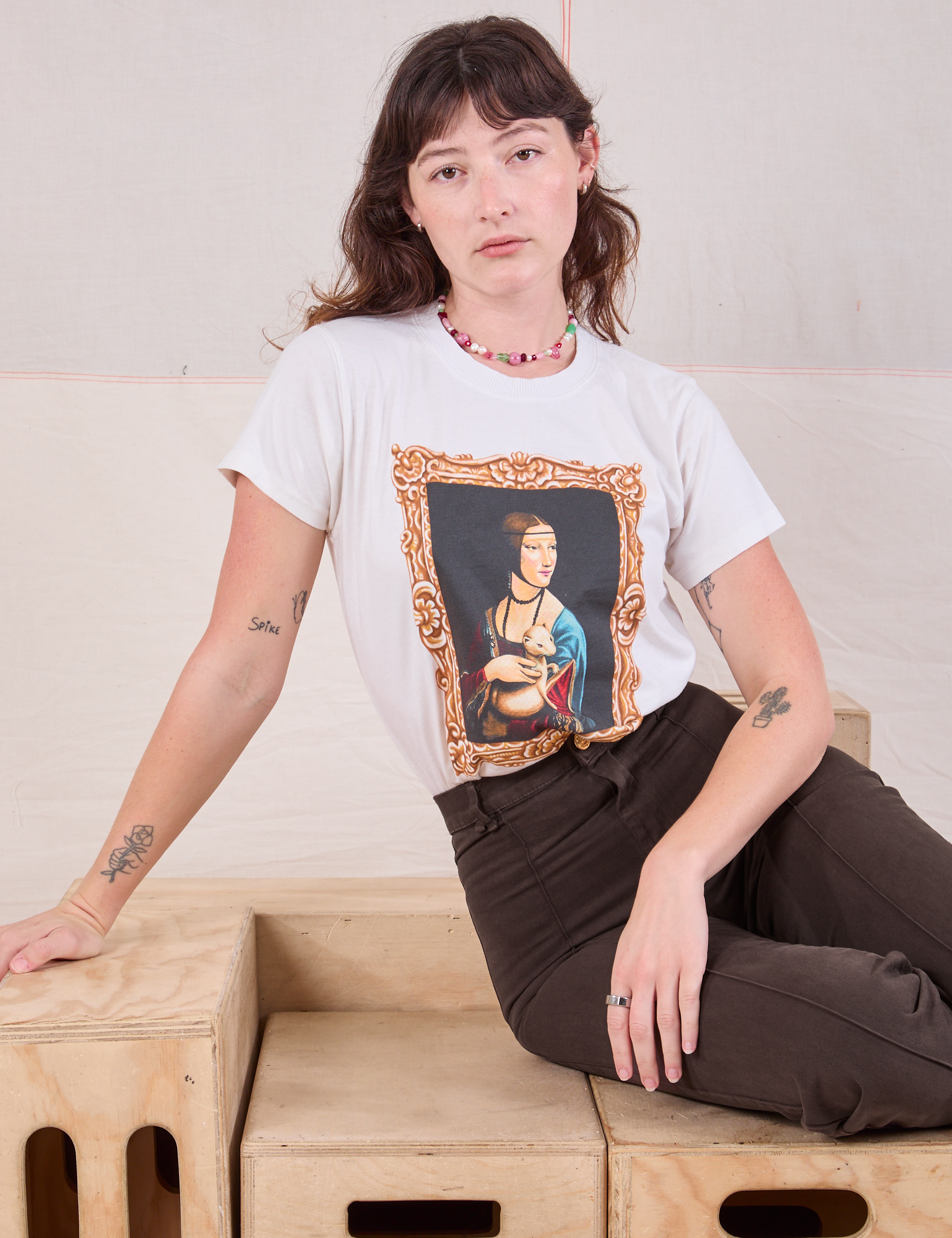 Alex is wearing Masters Organic Tee in Lady With An Ermine