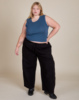 Juliet is 5'7" and wearing L Muscle Tee in French Blue paired with black Drop Pocket Cargo Pants