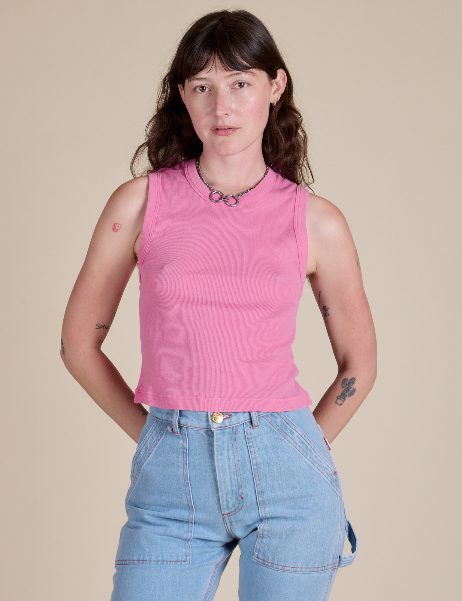 Alex is 5’8” and wearing P Muscle Tee in Bubblegum Pink 