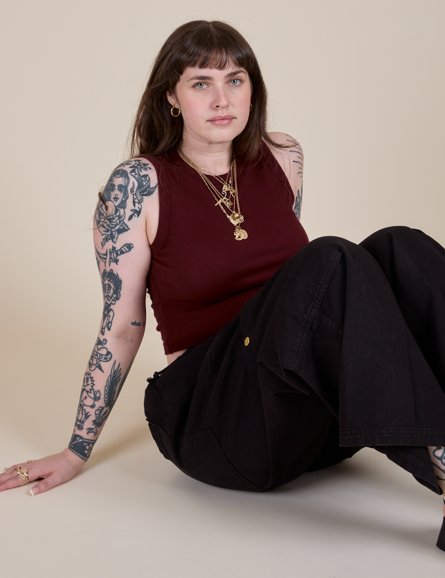 Muscle Tee in Red Wine and black Drop Pocket Cargo Pants worn by Sydney