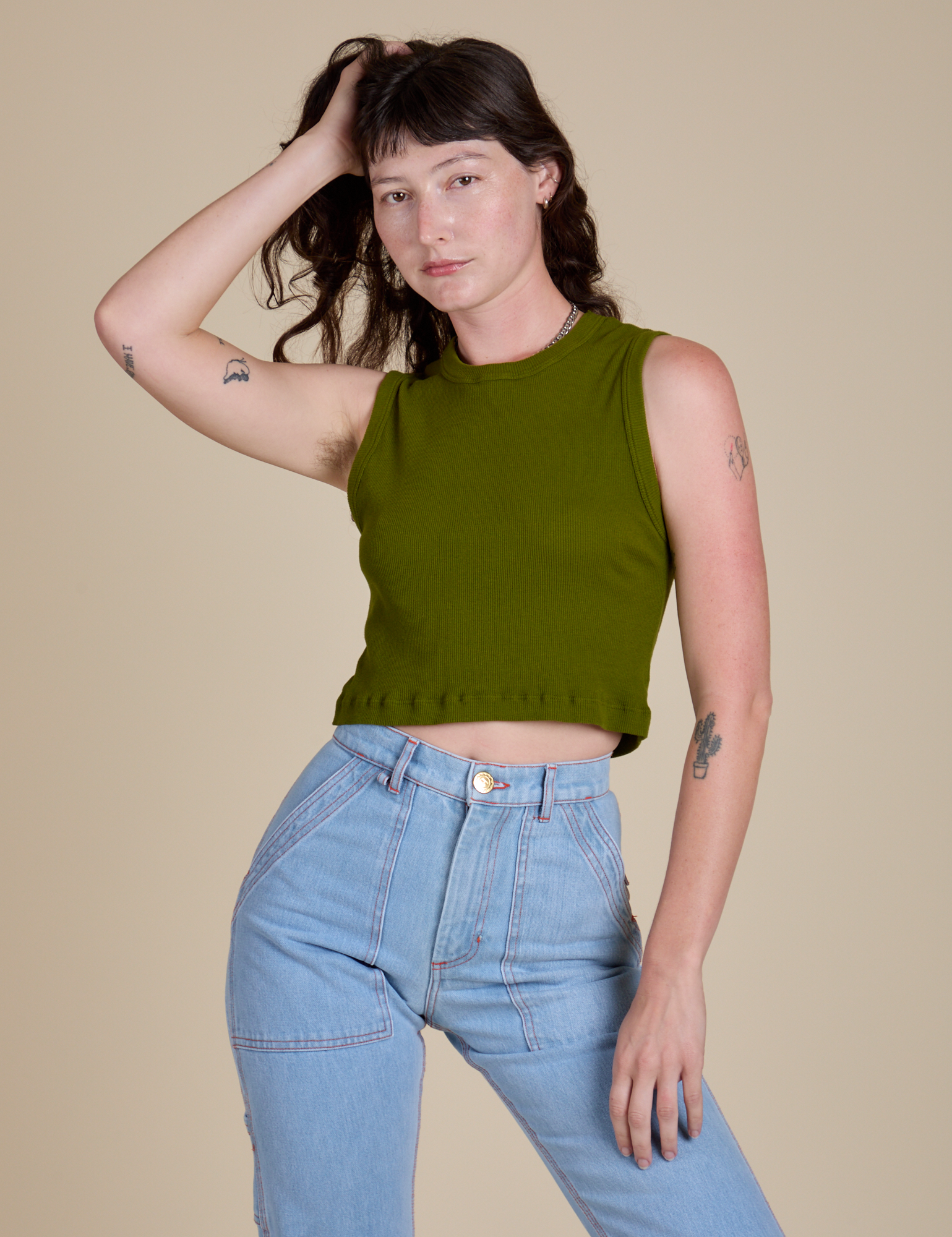 Alex is 5’8” and wearing XP Muscle Tee in Summer Olive