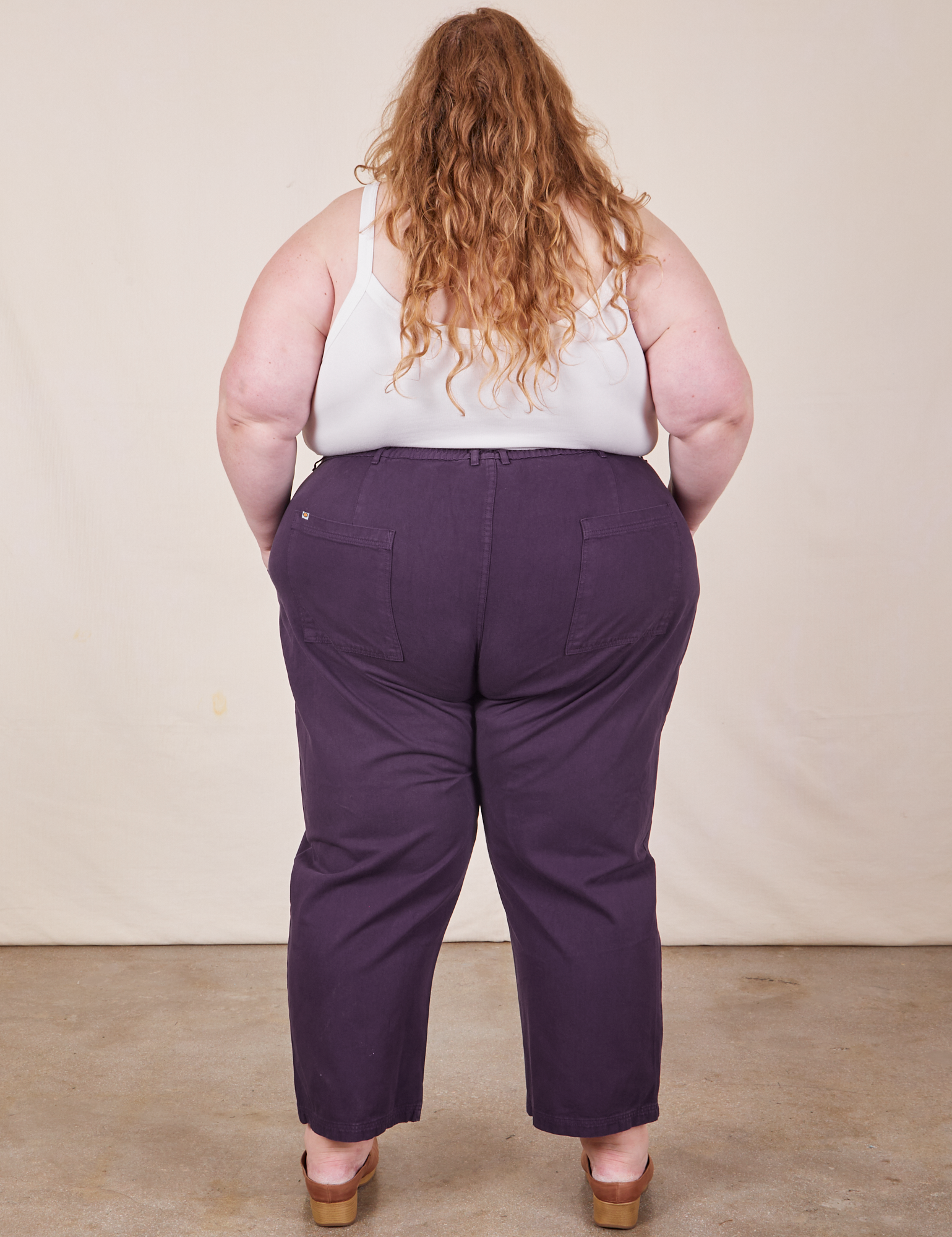 Back view of Work Pants in Nebula Purple worn by Catie