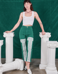 Alex is 5'8" and wearing XXS Column Work Pants in Hunter Green paired with vintage off-white Cropped Tank Top