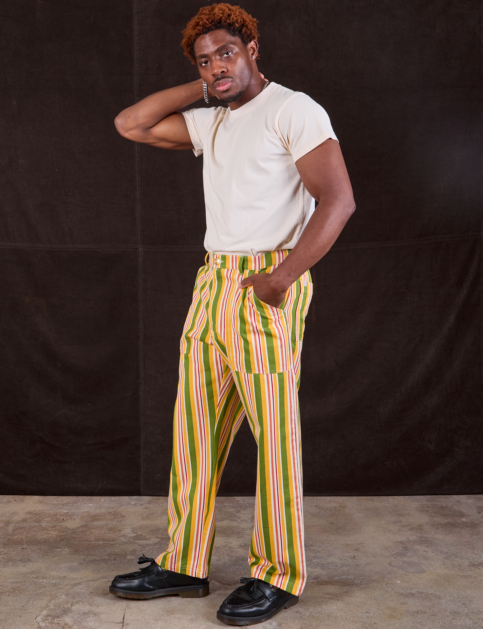 Issac is 5&#39;10&quot; and wearing M Stripe Work Pants in Vintage Sofa paired with Organic Vintage Tee in vintage tee off-white