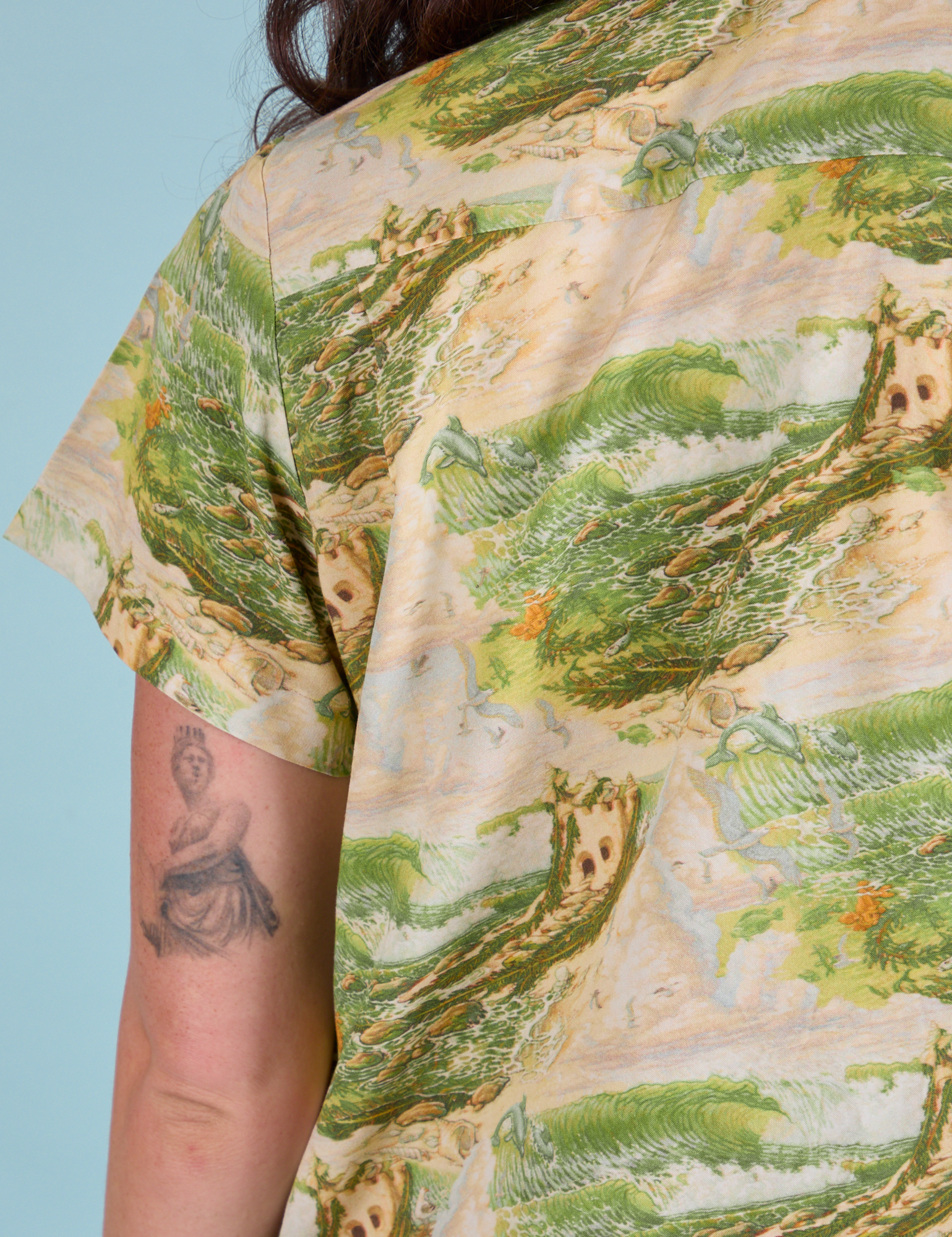 Pantry Button-Up in Ocean and Sky close up back shoulder on Alex