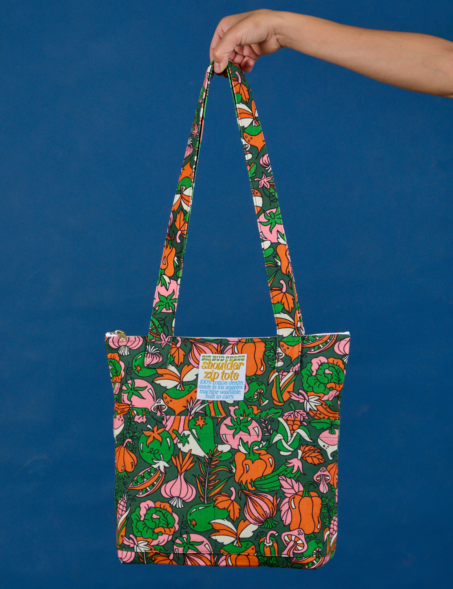 Kitchen Collection Printed Shoulder Zip Tote held by model